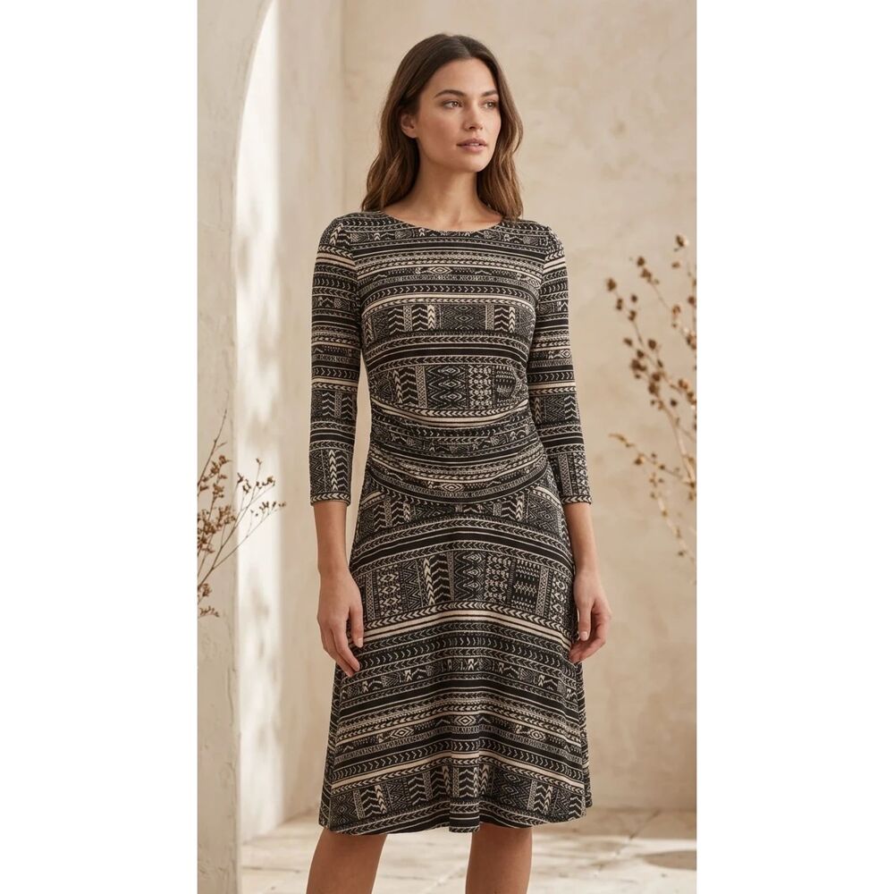 En Focus Studio Black and cream Shell: 95% Polyester, 5% Spandex